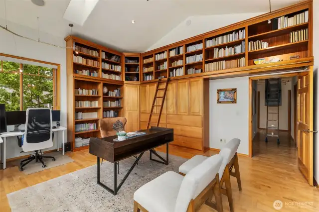 Now THIS is a cool office! Whether you like books, movies, records, or have some collectables, this is plenty of space for any of the above. Or, just enjoy the view!