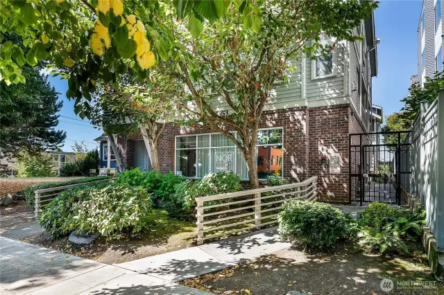 California Ave Condos. Access via gate to the right, unit 1-A is back to the left.