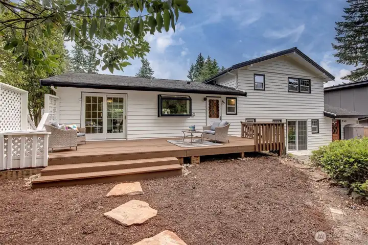 The backyard oasis-complete with mature landscaping, fruit trees.