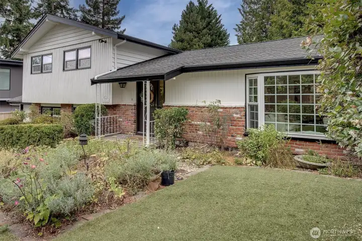 New exterior paint with brick accent walls.