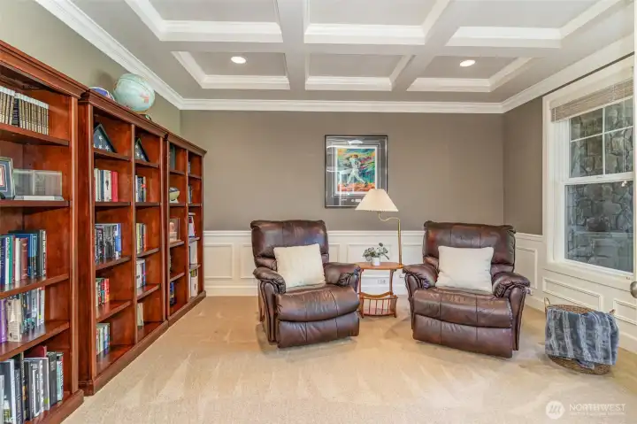 Main floor office or guest room with an adjacent 3/4 bathroom.