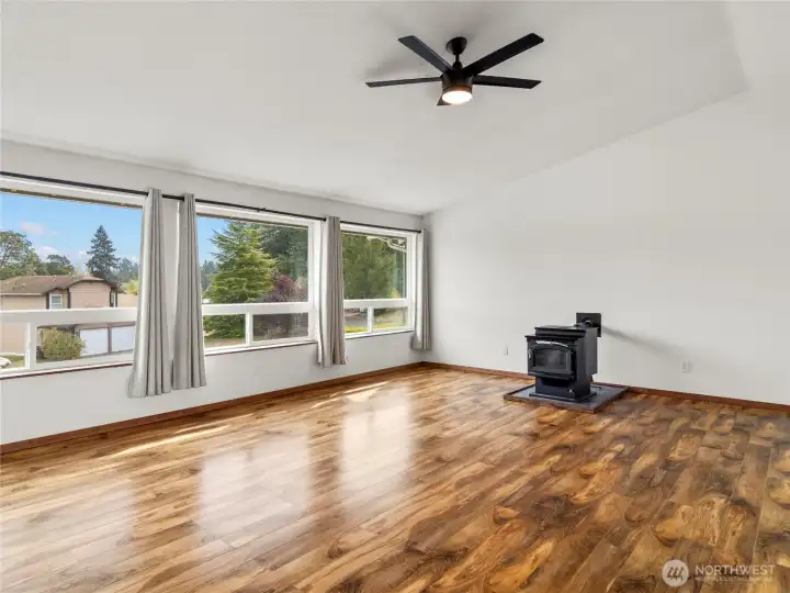 Oversized living room with big windows that show off Mt. Rainier