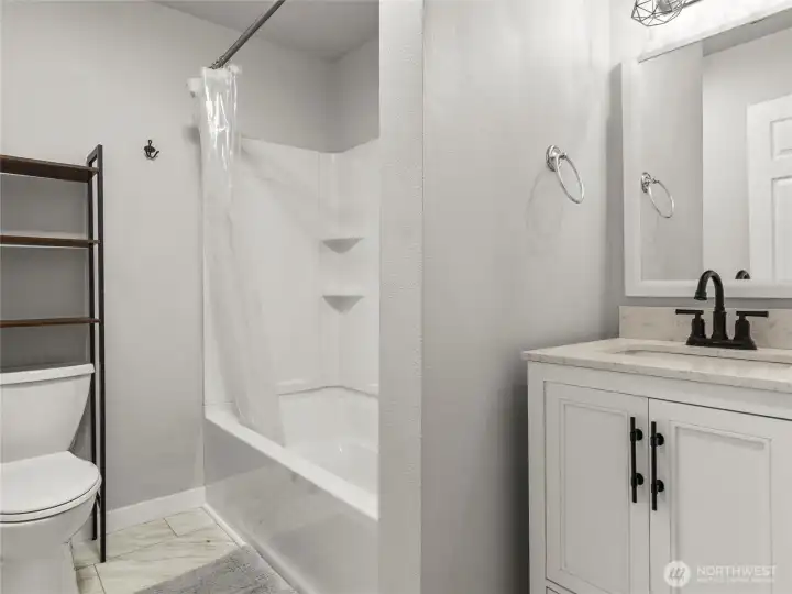 Full bathroom downstairs off garage/additional living space