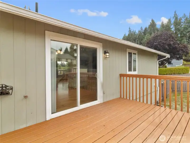 Plenty of deck space right outside the dining area/kitchen