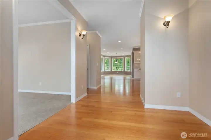Front entryway. Family room with fireplace to the left.