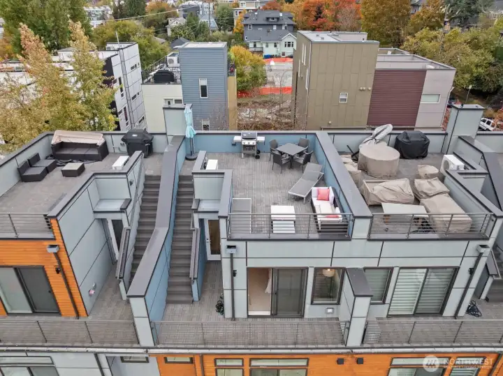 Spacious rooftop deck with city views