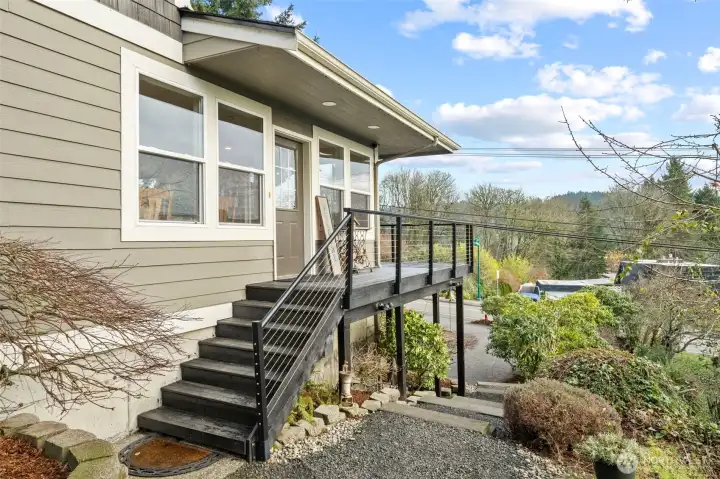 Front Door Entry. There is also a muddroom entrance and basement door entry.