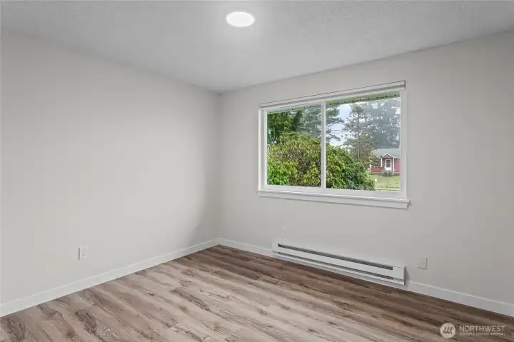 Pictured here is the first bedroom the home features