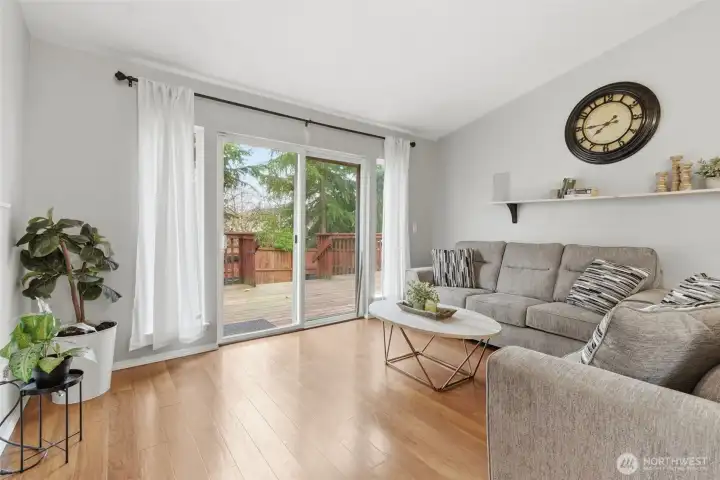 Sliding glass door leads to your huge back deck and fenced yard