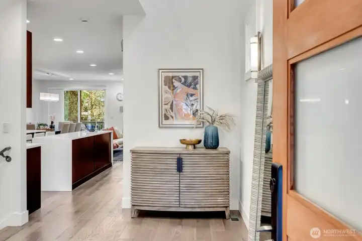 This luxury contemporary home welcomes you with a soaring two-story entry with skylight.