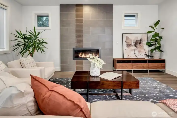 A stunning wall-mounted fireplace, creating a warm and inviting space for everyday living.