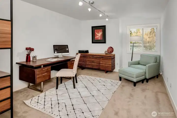 Spacious guest room #1 with walk-in closet.