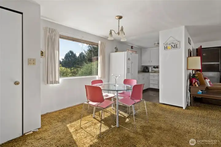 Dining room looking into kitchen.