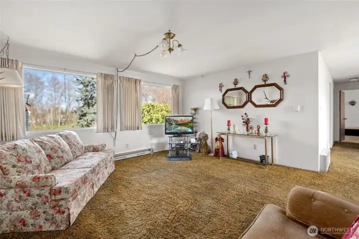 Living room with view to backyard.