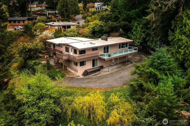 Amazing opportunity on Soundview Drive in Edmonds.  Custom built home, first time on the market.  Location, lot size, views, privacy, checks all the boxes