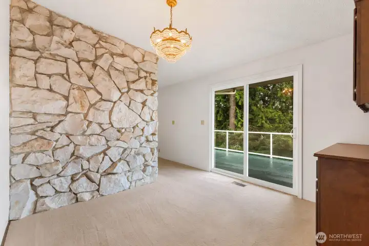 Formal dining space with deck access