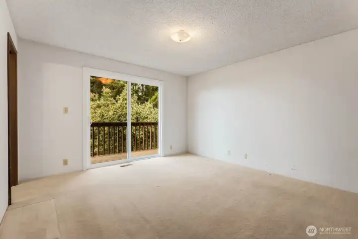 Primary bedroom with it's own deck access
