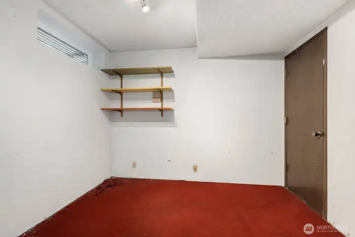 Yet another flex space, workout room, office etc with access to the garage