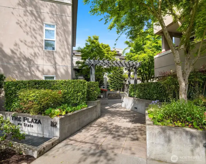 The Plaza on State Condominiums Entry - Newly refinished exterior is beautifully timed for new owners.