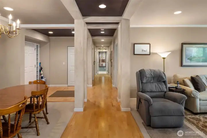 From the great room, this picture shows dining, foyer, hallway and living area.