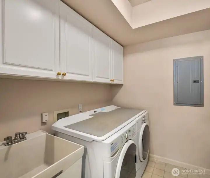 There's plenty of storage in the laundry room.