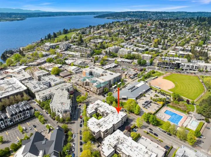 This aerial shows proximity to library, pools, and Lee Johnson Field.