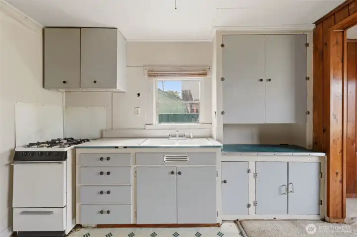 The kitchen view shows the storage and the window to the side yard. The kitchen view shows the storage and the window to the side yard.