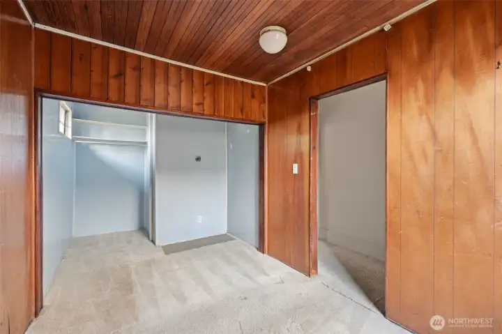 The one bedroom showing the closet area. The one bedroom showing the closet area.