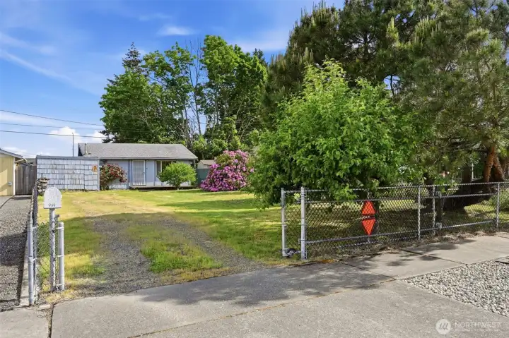 The property is fully fenced with a front entry gate. The property is fully fenced with a front entry gate.