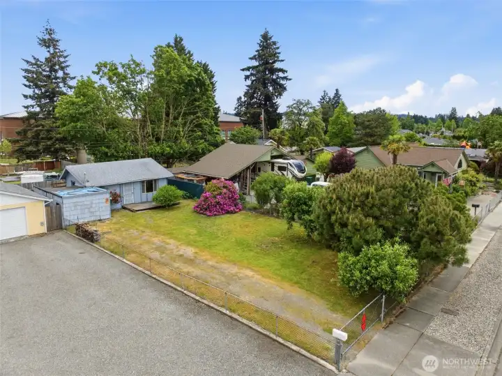 Aerial view showing the good sized lot and home location. Aerial view showing the good sized lot and home location.