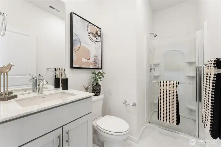 Bathroom down with walk-in shower. Bathroom down with walk-in shower.