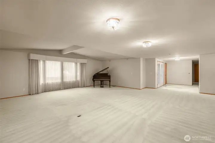 Entertainers dream great room.  large enough for grand piano and multiple sitting areas.