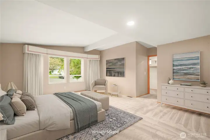 Virtually staged primary suite with walk-in closet and 3/4 ensuite