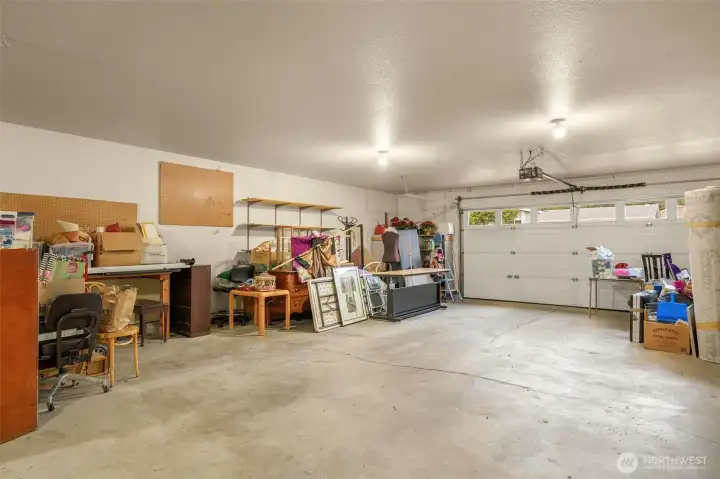 Yes, you might be able to fit 4 cars in this garage.