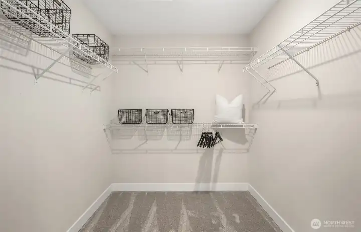 Primary walk-in closet Primary walk-in closet