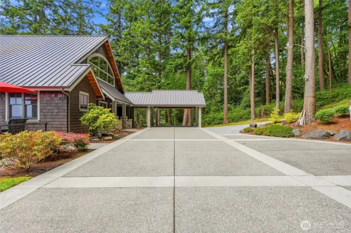 Plenty of parking in the large circular driveway with carport with separate entrance