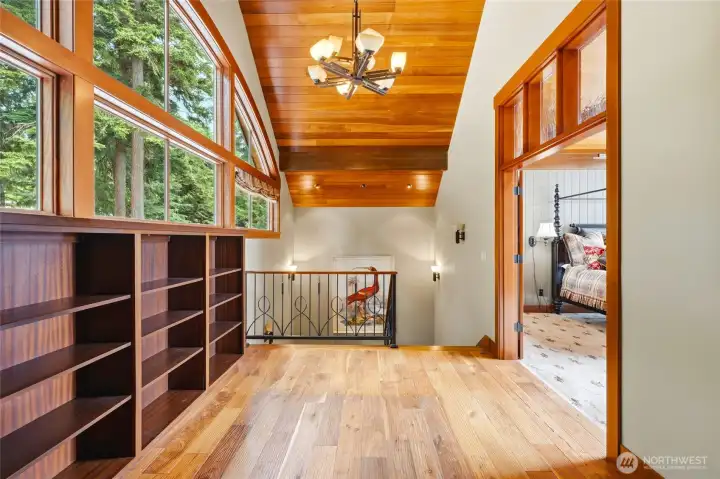 Bonus room rounds out the primary suite with built in book cases and another bonus space!