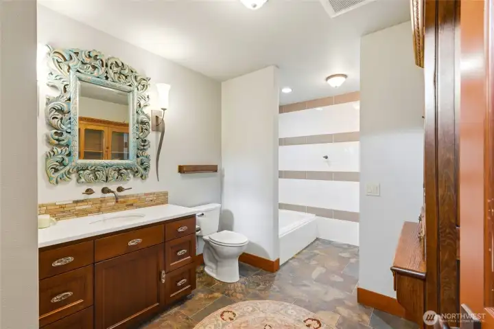 Lower level full bath with custom finishes throughout