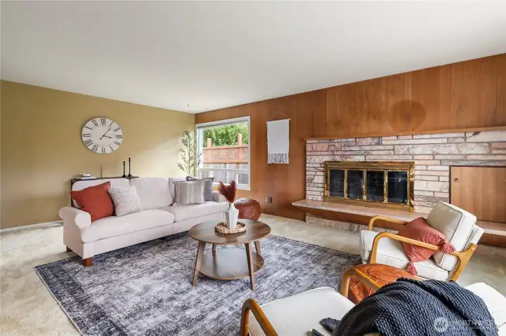 A striking Tennessee marble surround with a single-slab hearth makes this wood-burning fireplace a beautiful focal point of the living room. (Fireplace is currently not operational.)