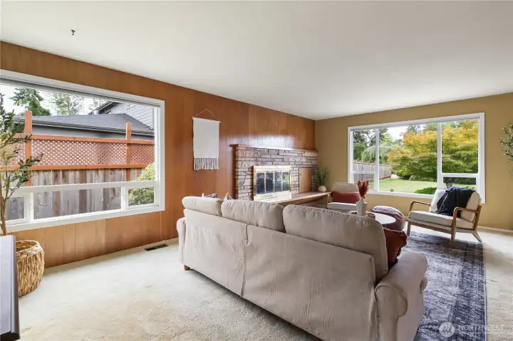Rich solid walnut wall panels highlight the exceptional custom craftsmanship and distinctive mid-century design that set this home apart.