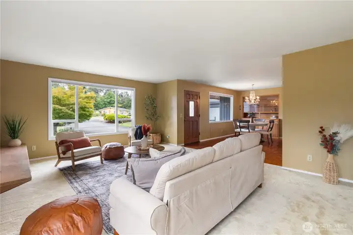 View from living room looking towards front entrance and formal dining room.