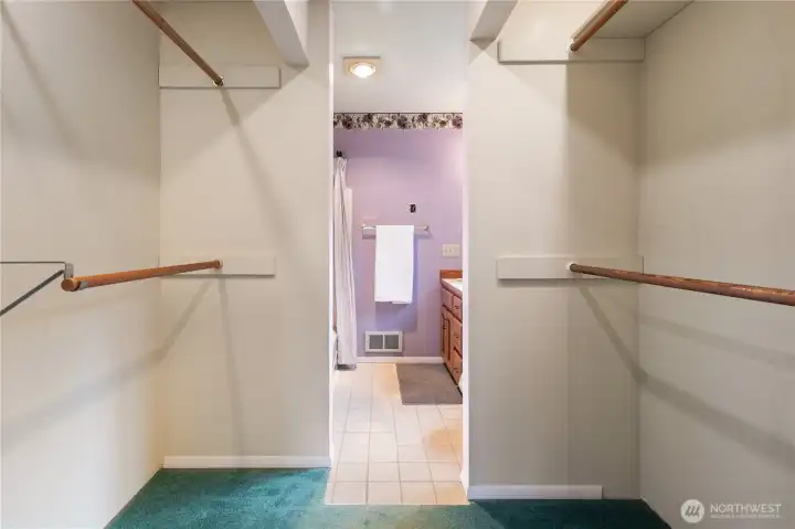 Walk-In closet from Primary bedroom looking towards bathroom.