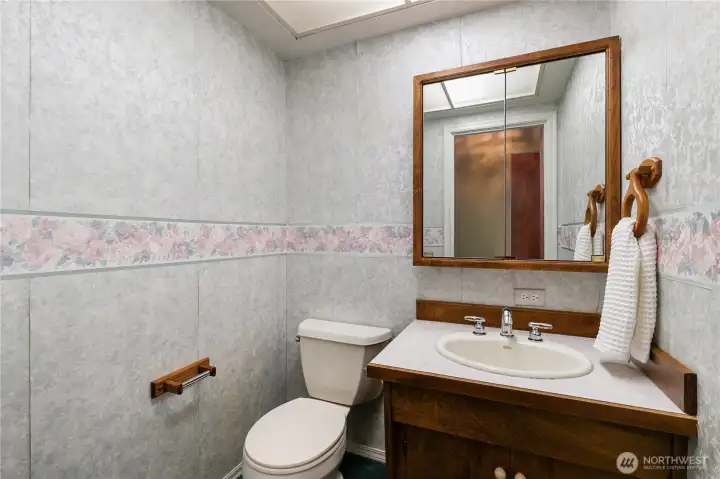 1/2 bath located off hallway