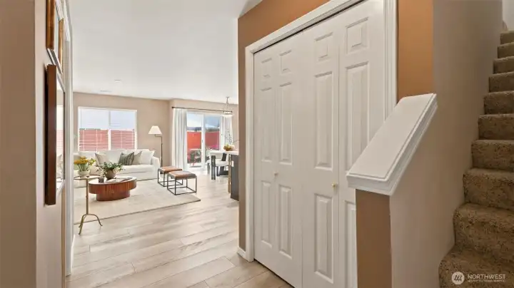 A light-filled foyer with high ceilings creates a warm first impression A light-filled foyer with high ceilings creates a warm first impression