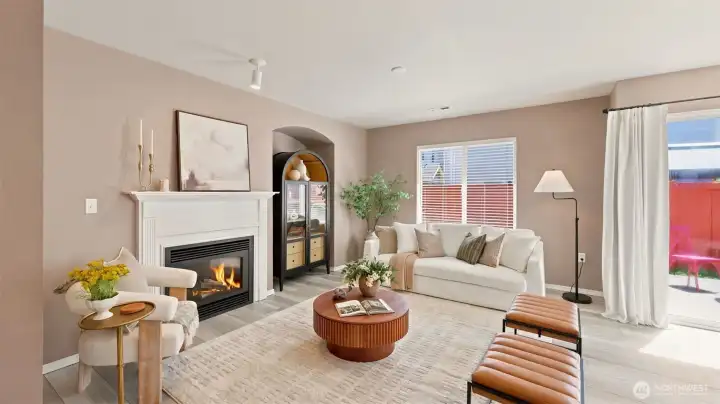 Step into comfort with this beautiful living room, complete with a warm fireplace Step into comfort with this beautiful living room, complete with a warm fireplace