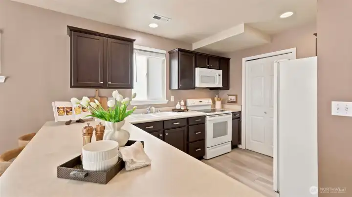 The perfect spot to Start your day gathering around the breakfast bar The perfect spot to Start your day gathering around the breakfast bar