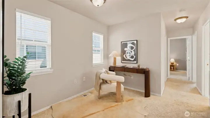 A versatile loft area perfect for a home office or cozy reading nook A versatile loft area perfect for a home office or cozy reading nook