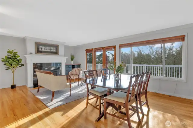 Formal living room & dining room --surrounded by windows for natural light --with western views.