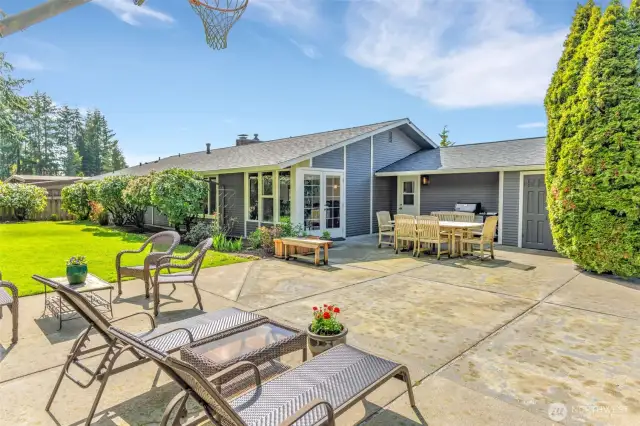 Expansive back patio and level gardens and yard.  So much space for outdoor entertaining and enjoying!