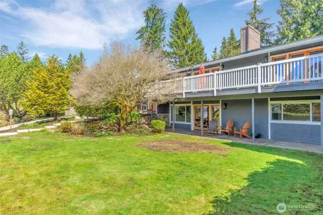 Front yard with view towards the front of the home--surrounded by established garden and plantings for ultimate privacy.
